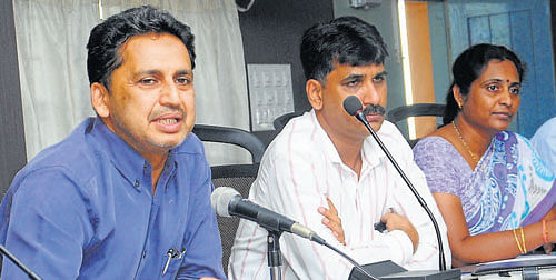 Deputy Commissioner A B Ibrahim chairs a co-ordination committee meeting with NGOs at his office in Mangalore on Wednesday.