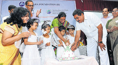 Minister for Forests, Ecology and Environment B Ramanath Rai launches the Project Angel,  an initiative by Inchara Foundation and Rotary Club, to check child abuse, at Roshni Nilaya School of Social Work in Mangalore on Tuesday.