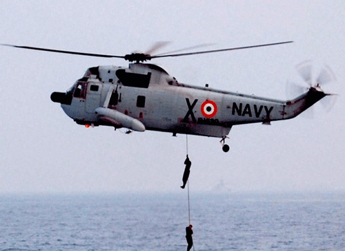 Two pilots and two crew members had a narrow escape when an Indian Navy helicopter crashed while landing at a heliport in Maharashtra Thursday, officials said. PTI photo representation only