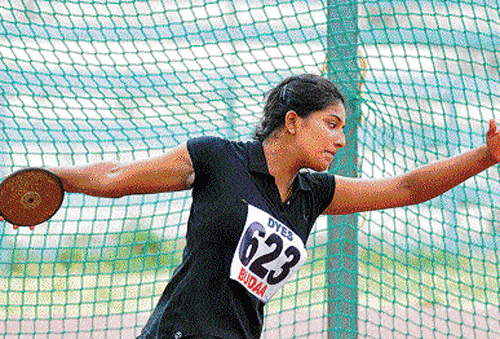milestone: Dakshina Kannada's JS&#8200;Priyanka created a new meet record in the under-20 girls discus throw at the State Junior and Senior Athletic Championships. dh photo