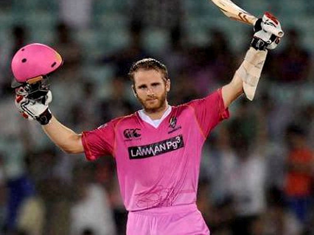Northern Knights batsman Kane Williamson celebrates after complete his century against Cape Cobras during their Champions League Twenty20 match at Raipur on Friday. PTI