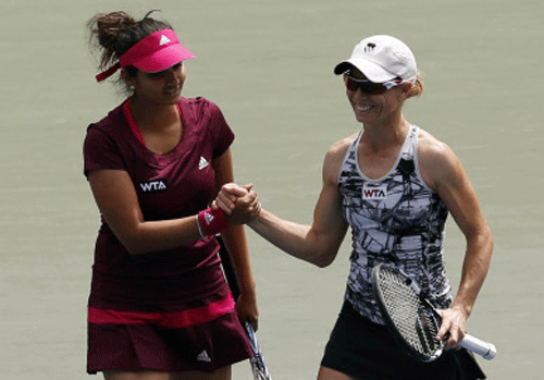Maintaining her rich vein of form in the current season, Indian tennis ace Sania Mirza and her Zimbabwean partner Cara Black today bagged the women's doubles title at the WTA Toray Pacific Open with a 6-2 7-5 victory over Spain's Garbine Muguruza and Carla Suarez Navarro. Reuters photo