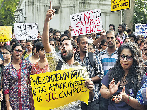 Students in New Delhi take part in a rally on Saturday against the  alleged molestation of a Jadavpur University student. PTI