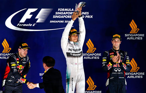 Lewis Hamilton regained the Formula One drivers' world championship lead on Sunday when he claimed victory in the Singapore Grand Prix after his Merce. Reuters Image
