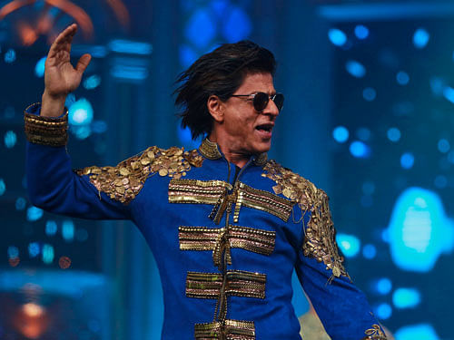 Shah Rukh Khan along with Bollywood A-listers Abhishek Bachchan, Deepika Padukone, Malaika Arora Khan and Farah Khan mesmerized the thousands of South Asians through their scintillating performance in a suburb of the American Capital last night. AP file pohoto
