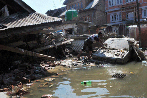 Self-help groups are doing their best in the areas of sanitation and hygiene in flood-ravaged Kashmir Valley, where hundreds of people perished in devastating floods and where carcasses of animals are floating in the steets now in many towns, unleashing the fear of epidemics. PTI File Photo