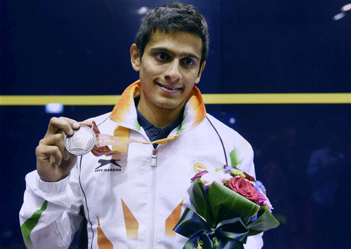 India's Saurav Ghosal let slip away a maiden gold well within his grasp, snatching defeat from the jaws of victory in the men's squash individual final of the 17th Asian Games here on Tuesday. / PTI PHoto