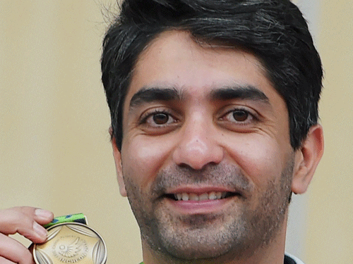 Having captured his first individual medal in his swansong Asian Games, ace shooter Abhinav Bindra said he felt really happy about breaking the jinx. / PTI PHoto