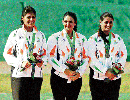 ALL SMILES Varsha Varman, Shagun Chowdary and Shreyasi Singh (from left) with their bronze medals in the women's double trap event in Incheon on Thursday. PTI
