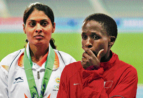 sad moment Bahrain's Ruth Jebet (right) is distraught as the decision to disqualify her is announced just before the gold medal presentation. India's Lalita Babar (left) looks on. PTI