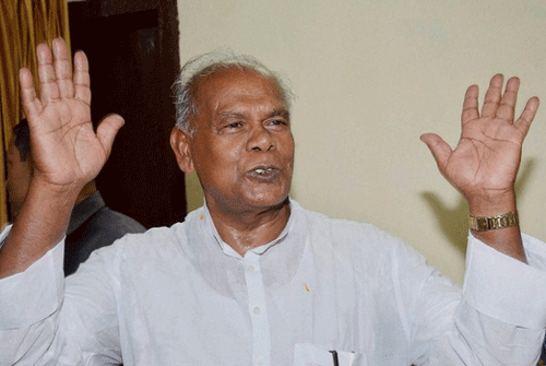 A day after his claims that a temple in Bihar's Madhubani district was washed and purified soon after his visit there for obeisance, Chief Minister Jitan Ram Manjhi today ordered a probe. PTI file photo