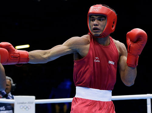 Vikas Krishan, however, kept alive his medal hopes as he eased past Azamat Uulu Kanybek of Kyrgyzstan to reach the last eight stage of the middle weight (75kg) category. AP file photo