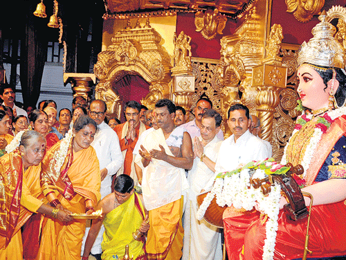 Two widowed Dalit priestesses perform puja at the Kudroli  Gokarnanatheshwara temple in Mangalore on Monday. Former union minister B Janardhana Poojary is also seen. DH Photo