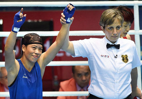Controversy hit the Asian Games boxing competition after India's L Sarita Devi (60kg) had to settle for a bronze medal despite dominating her semifinal bout even as M C Mary Kom (51kg) continued her winning run to enter the summit clash of the mega-event here today. PTI photo