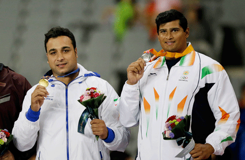 Vikas Gowda lost out to his old nemesis and defending champion Ehsan Hadadi of Iran once again. AP Photo