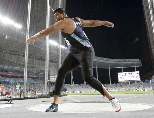 India's Vikas Gowda competes in men's discus throw final at the 17th Asian Games in Incheon, South Korea, Tuesday, Sept. 30, 2014. (AP Photo