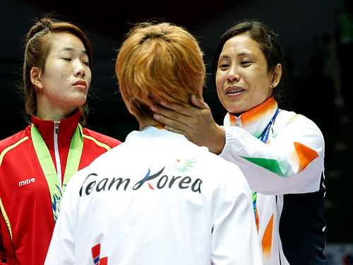 India's woman Boxer Sarita Devi is facing an AIBA probe for returning her bronze medal. Reuters Image