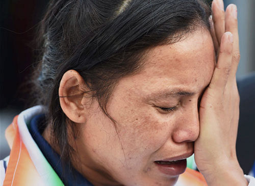Boxer L Sarita Devi stunned the Asian Games authorities here on Wednesday when she refused to wear her bronze medal before presenting it back to her semifinal opponent Park Jina, a move that could land her a stiff punishment from the international body. PTI file photo
