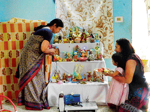 Traditional: Aruna Shankar, Sharmista BS with daughter Arushi.