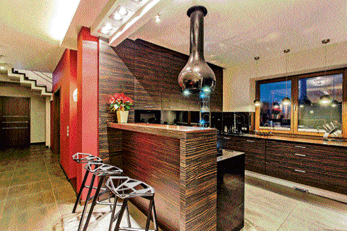 MAKING SPACE: You could try raising a bar counter attached to your kitchen.