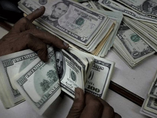 Falling for the fourth week in a row, India s foreign exchange reserves went down by USD 1.415 billion to USD 314.181 billion in the week to September 26 on account of a hefty drop in non-US currency assets. PTI file photo