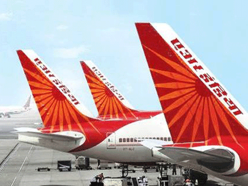 Cracking the whip against negligent Air India employees, Civil Aviation Minister Ashok Gajapathi Raju Saturday suspended ground handling and security officers for lapses in detecting a stun grenade in one of the airline's planes that was to operate from Jeddah to Mumbai. PTI File Photo