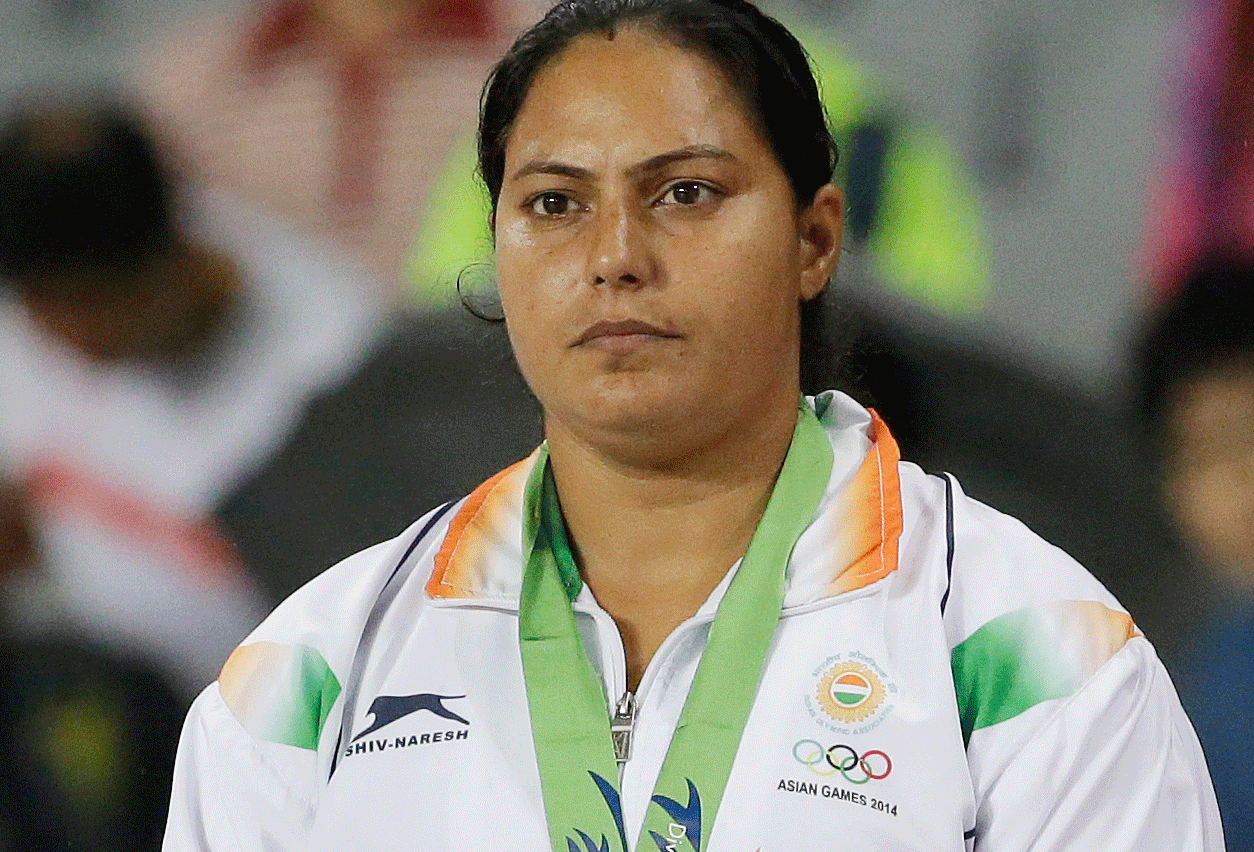 India's hammer thrower Manju Bala is set to win the silver medal after gold medal winner Zhang Wenxui of China failed a dope test. / AP Photo