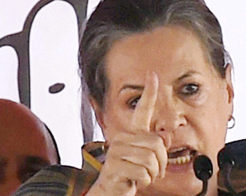 Sonia Gandhi addresses an election rally in Haryana on Saturday. PTI