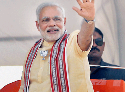 Modi said he would not utter a single word against the Shiv Sena. 'Political pundits are asking why Modi is not criticising the Shiv Sena. This is the first election in the absence of the late Bal Thackeray, for whom I have great respect. I have decided not to utter a single word against the Shiv Sena. This is my tribute to Balasaheb Thackeray,' he said. / PTI Photo