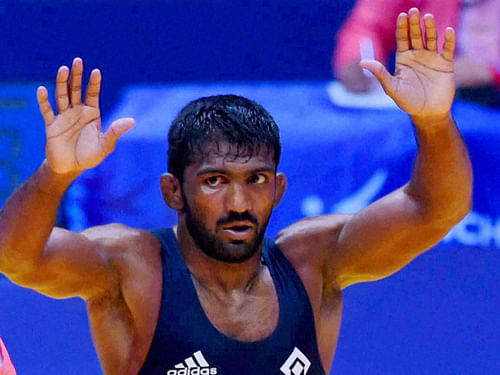 Happy to have ended India's 28-year-long wait for a wrestling gold at the recent Asian Games, star grappler Yogeshwar Dutt is now aiming for a yellow metal at next year's World Championships and thereby earn an automatic berth in the 2016 Rio Olympics. PTI file photo