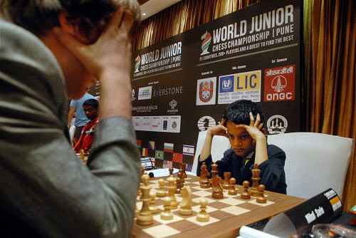 Players on the second day of World Junior Chess Championship in Pune on Tuesday. PTI Photo