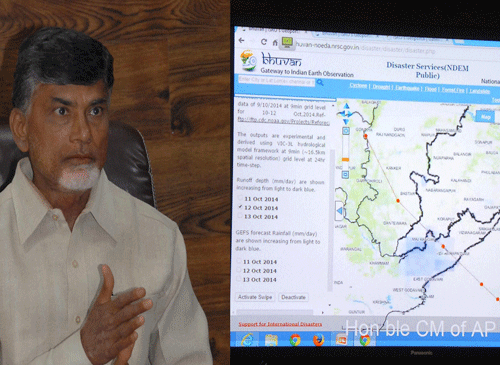 AP Chief Minister N Chandra Babu Naidu reviews the preparedness for Cyclone HudHud, in Hyderabad on Saturday. PTI Photo