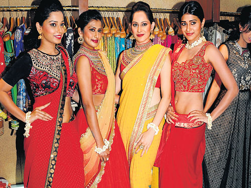 Shades of red, lime green, fuchsia and royal blue caught everyone's attention at a fashion show held at the Ritu Kumar showroom recently to unveil the bridal collection of 201. DH Photo