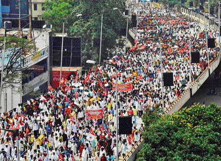 Jam-packed: A protest march by the Karnataka Prantha Raitha Sangha on Monday brought traffic to a grinding halt in the Central Business District. KPN