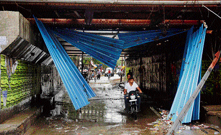 A damaged underpass after heavy rainfall and storm caused by Hudhud cyclone in Allahabad on Tuesday. PTI