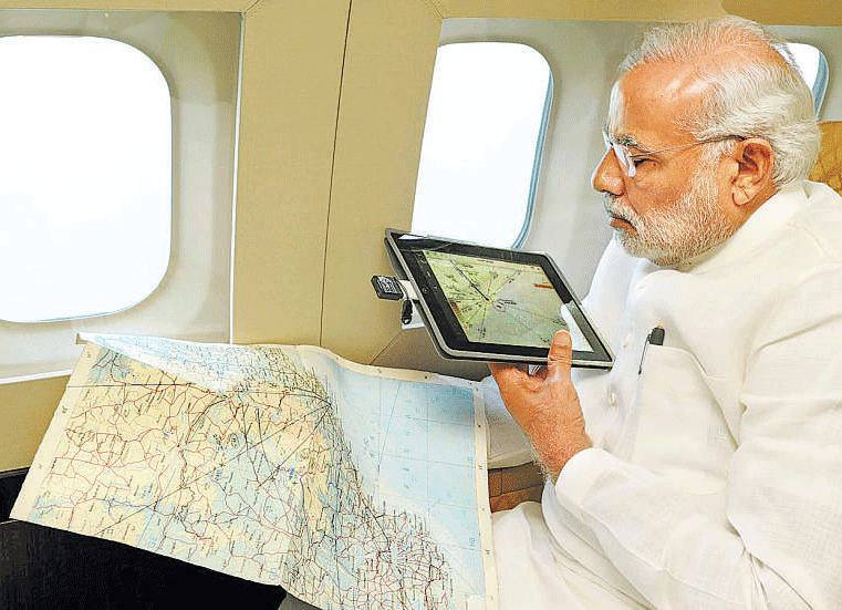 Prime Minister Narendra Modi makes an aerial survey of cyclone affected areas of Andhra Pradesh on Tuesday. PTI