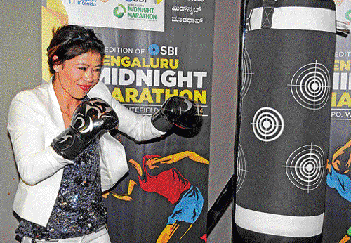 The champ: Boxer Mary Kom shows her skills at a function on Wednesday. DH PHOTO