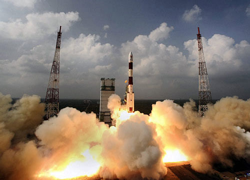 India successfully launched IRNSS 1C on board ISRO's PSLV C26 rocket from the spaceport here at 1.32 am today, moving a step closer to setting up the country's own navigation system on par with Global Positioning System (GPS) of the US. File photo PTI