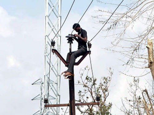 Power supply has been partially restored in Visakhapatnam district and mobile communication services have also significantly improved, bringing some relief to the people facing harrowing times after Sunday's devastating Cyclone Hudhud. PTI photo