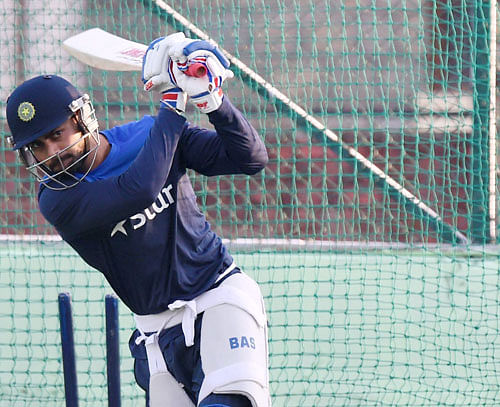 Virat Kohli bats in the nets during a practice session in Dharamshala on Thursday ahead of the 4th ODI cricket match against West Indies. PTI