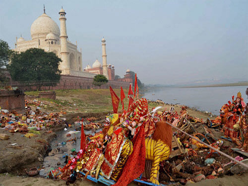 A fortnight after Prime Minister Narendra Modi launched the Clean India campaign, the authorities here have warned that action would be taken against encroachers and garbage dumpers in this Taj city. PTI file photo