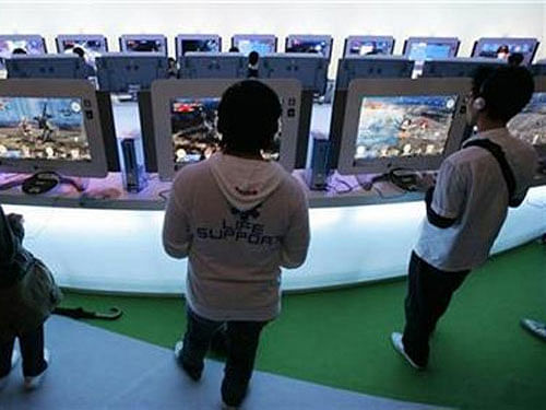 People who play action video games such as Call of Duty or Assassin's Creed are quicker learners of skills such as typing or riding a bike, a study says. Reuters file photo. For representation purpose