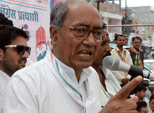 Digvijay Singh demanded from Narendra Modi to pay Rs three lakh each to citizens of the country as promised by him. PTI File Photo