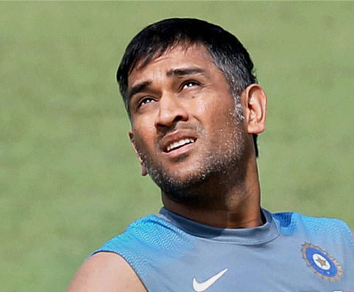 Allan Border, Steve Waugh and Ricky Ponting are of the opinion that leading India in all three formats of the game is troubling Mahendra Singh Dhoni. AP File Photo