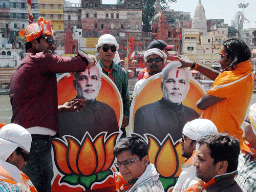 The BJP said Sunday that its impending electoral victories in Maharashtra and Haryana showed people were enamoured of Prime Minister Narendra Modi. PTI file photo