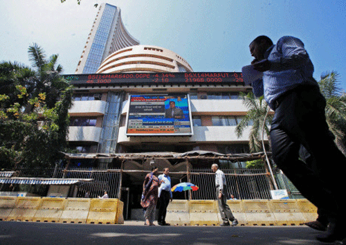 After losing 0.71 percent in the last weekly trade session, a benchmark index of Indian equities markets Monday provisionally closed the days trade 321.32 points or 1.23 percent up as automobile, banks, capital goods, oil and gas and metal stocks gained. PTI file photo