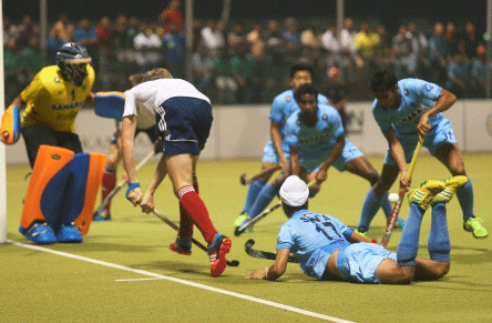 Indian Hockey players vie for the ball during final of the Sultan of Johor Cup 2014 by defeating Great Britain, in Johor Bahru on Sunday. PTI Photo