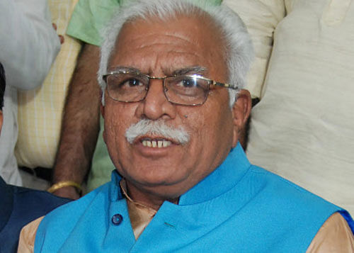 Haryana Chief Minister-designate Manohar Lal Khattar talking to media in Chandigarh on Tuesday. PTI Photo