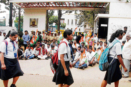 Youth Congress workers stage a protest outside the school on Thursday. KPN