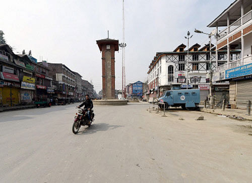 A view of deserted Lal Chowk during a strike call given by separatist groups on Thursday to protest against Prime Minister Narendra Modi's visit to Srinagar to celebrate Diwali with flood victims. PTI